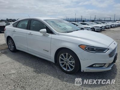 Czwarte zdjęcie samochodu z boku: 2017 FORD FUSION SE HYBRID VIN:3FA6P0LU5HR409486 - miniatura