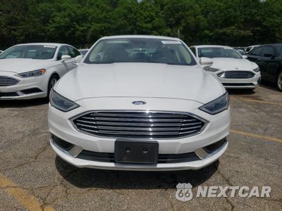 Piąte zdjęcie samochodu w środku: 2018 FORD FUSION SE HYBRID VIN:3FA6P0LUXJR281915 - miniatura
