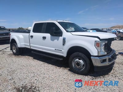 Czwarte zdjęcie samochodu z boku: 2021 FORD F350 SUPER DUTY VIN:1FT8W3DT2MEC12298 - miniatura
