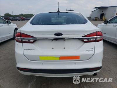 Zdjęcie 6 z 12 samochodu: 2017 FORD FUSION SE HYBRID VIN:3FA6P0LU1HR410067 - miniatura