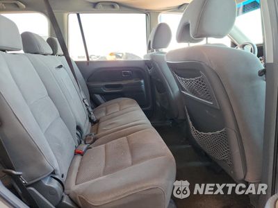 Zdjęcie 11 z 13 samochodu: 2006 HONDA PILOT EX VIN:2HKYF18456H544830 - miniatura