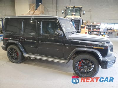 Czwarte zdjęcie samochodu z boku: 2021 MERCEDES-BENZ G 63 AMG VIN:W1NYC7HJ7MX390150 - miniatura