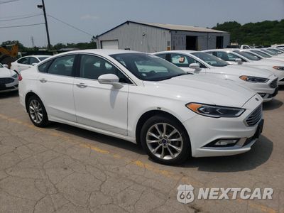 Czwarte zdjęcie samochodu z boku: 2017 FORD FUSION SE HYBRID VIN:3FA6P0LU6HR410064 - miniatura