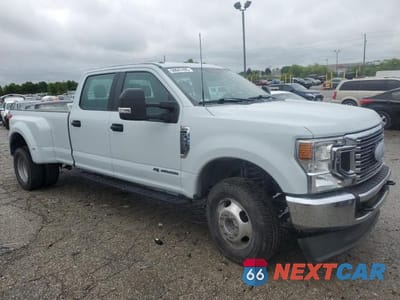 Czwarte zdjęcie samochodu z boku: 2022 FORD F350 SUPER DUTY VIN:1FT8W3DT5NED71561 - miniatura