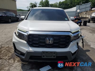 Piąte zdjęcie samochodu w środku: 2023 HONDA PASSPORT EXL VIN:5FNYF8H55PB010292 - miniatura