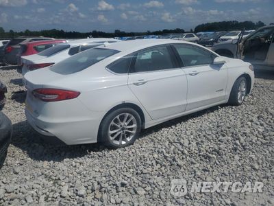 Trzecie zdjęcie samochodu z tyłu: 2019 FORD FUSION SE VIN:3FA6P0LU5KR264005 - miniatura