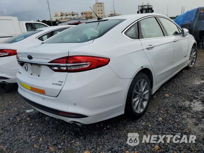 Trzecie zdjęcie samochodu z tyłu: 2018 FORD FUSION SE HYBRID VIN:3FA6P0LU1JR278692 - miniatura