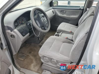 Zdjęcie 7 z 13 samochodu: 2002 HONDA ODYSSEY LX VIN:2HKRL18502H546808 - miniatura