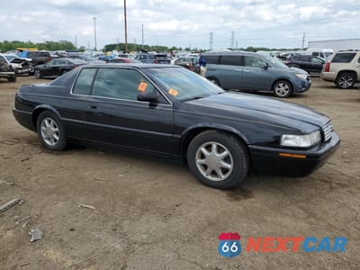 Czwarte zdjęcie samochodu z boku: 2002 CADILLAC ELDORADO TOURING VIN:1G6ET12972B103716 - miniatura