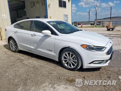 Czwarte zdjęcie samochodu z boku: 2017 FORD FUSION SE HYBRID VIN:3FA6P0LUXHR408995 - miniatura