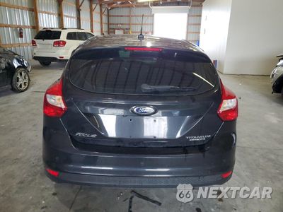 Zdjęcie 6 z 14 samochodu: 2013 FORD FOCUS TITANIUM VIN:1FADP3N24DL187939 - miniatura