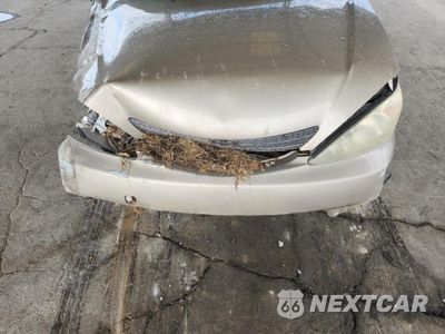 Zdjęcie 11 z 12 samochodu: 2003 TOYOTA CAMRY LE VIN:JTDBE32K630181359 - miniatura