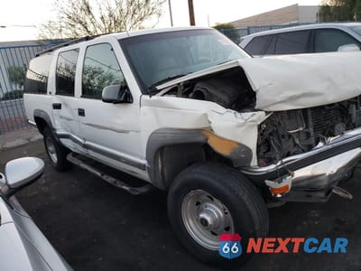 Czwarte zdjęcie samochodu z boku: 1996 GMC SUBURBAN K2500 VIN:1GKGK26J0TJ714332 - miniatura