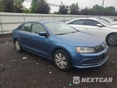 Czwarte zdjęcie samochodu z boku: 2017 VOLKSWAGEN JETTA S VIN:3VW2B7AJ4HM342480 - miniatura