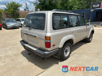 Czwarte zdjęcie samochodu z boku: 1991 TOYOTA LAND CRUISER FJ80 VIN:JT3FJ80W2M0011487 - miniatura