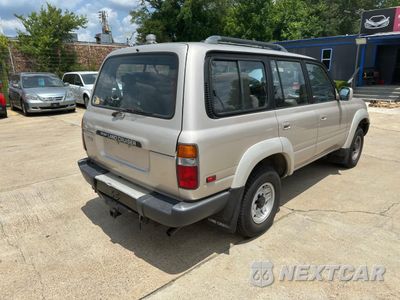 Czwarte zdjęcie samochodu z boku: 1991 TOYOTA LAND CRUISER FJ80 VIN:JT3FJ80W2M0011487 - miniatura