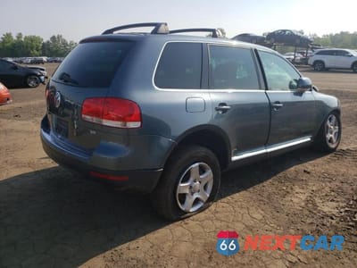 Trzecie zdjęcie samochodu z tyłu: 2004 VOLKSWAGEN TOUAREG 3.2 VIN:WVGZC67L34D001669 - miniatura