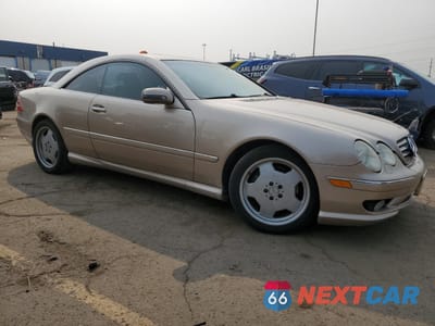 Czwarte zdjęcie samochodu z boku: 2001 MERCEDES-BENZ CL 55 AMG VIN:WDBPJ73JX1A012174 - miniatura