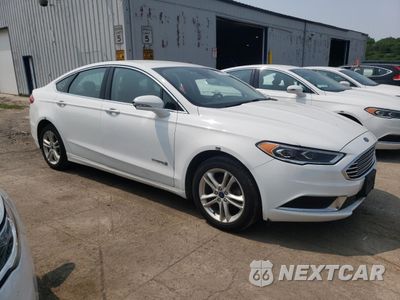 Czwarte zdjęcie samochodu z boku: 2018 FORD FUSION SE HYBRID VIN:3FA6P0LU8JR118745 - miniatura