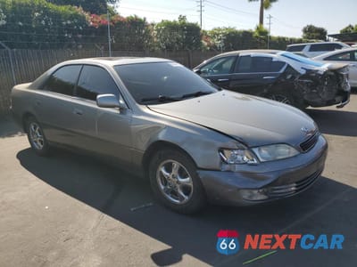 Czwarte zdjęcie samochodu z boku: 1997 LEXUS ES 300 VIN:JT8BF22GXV5000920 - miniatura