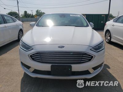 Piąte zdjęcie samochodu w środku: 2018 FORD FUSION SE HYBRID VIN:3FA6P0LU6JR172061 - miniatura