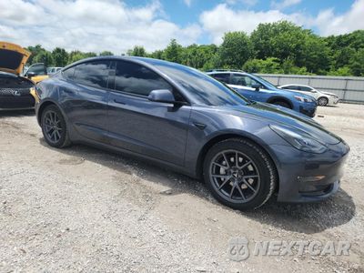 Czwarte zdjęcie samochodu z boku: 2021 TESLA MODEL 3 VIN:5YJ3E1EB3MF903054 - miniatura