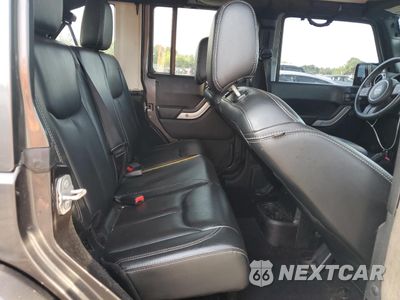 Zdjęcie 11 z 15 samochodu: 2014 JEEP WRANGLER UNLIMITED SAHARA VIN:1C4HJWEG9EL240338 - miniatura