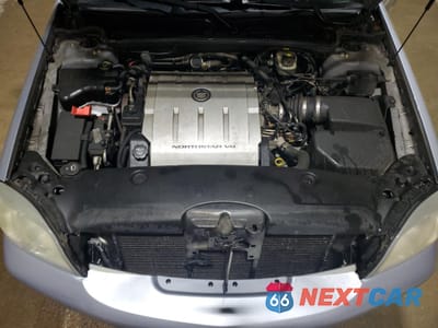 Zdjęcie 11 z 12 samochodu: 2004 CADILLAC DEVILLE VIN:1G6KD54Y84U236455 - miniatura