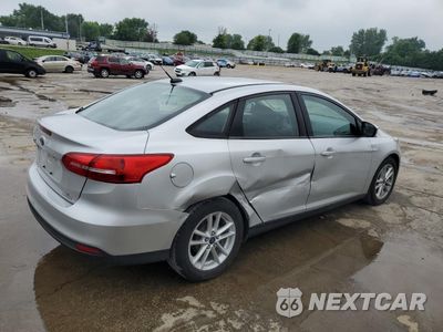 Trzecie zdjęcie samochodu z tyłu: 2015 FORD FOCUS SE VIN:1FADP3F26FL357140 - miniatura