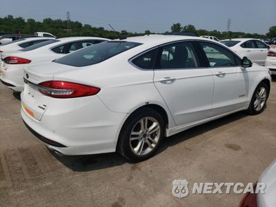 Trzecie zdjęcie samochodu z tyłu: 2018 FORD FUSION SE HYBRID VIN:3FA6P0LU8JR118745 - miniatura