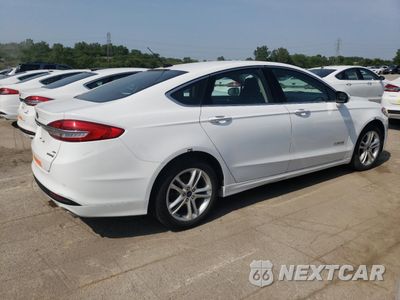 Trzecie zdjęcie samochodu z tyłu: 2018 FORD FUSION SE HYBRID VIN:3FA6P0LU3JR172079 - miniatura