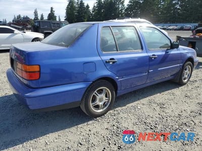 Trzecie zdjęcie samochodu z tyłu: 1998 VOLKSWAGEN JETTA TDI VIN:3VWRF81H0WM262841 - miniatura