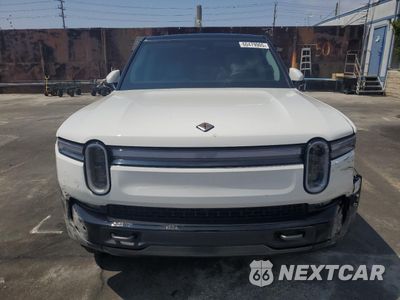 Piąte zdjęcie samochodu w środku: 2025 RIVIAN R1S PREMIUM VIN:7PDSGCBP8SN064110 - miniatura