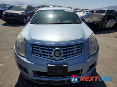 Piąte zdjęcie samochodu w środku: 2014 CADILLAC SRX VIN:3GYFNAE34ES582876 - miniatura