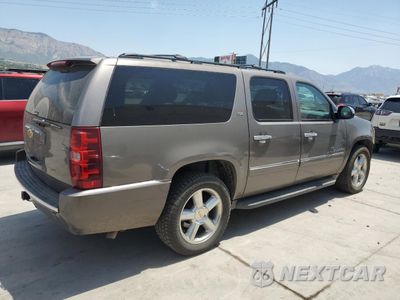 Trzecie zdjęcie samochodu z tyłu: 2013 CHEVROLET SUBURBAN K1500 LTZ VIN:1GNSKKE71DR213679 - miniatura