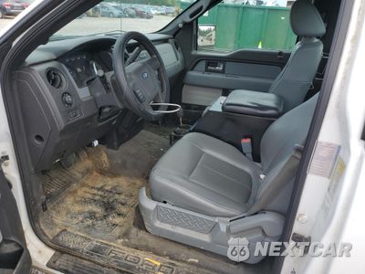 Zdjęcie 7 z 12 samochodu: 2014 FORD F150 VIN:1FTMF1CM3EKE73567 - miniatura
