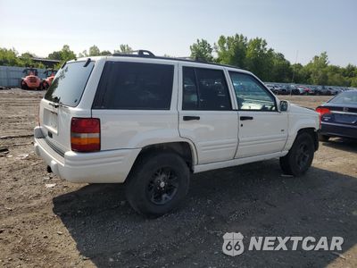Trzecie zdjęcie samochodu z tyłu: 1997 JEEP GRAND CHEROKEE LIMITED VIN:1J4GZ78S2VC585859 - miniatura