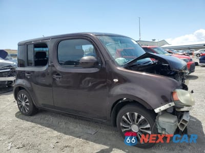 Czwarte zdjęcie samochodu z boku: 2011 NISSAN CUBE BASE VIN:JN8AZ2KR4BT200922 - miniatura