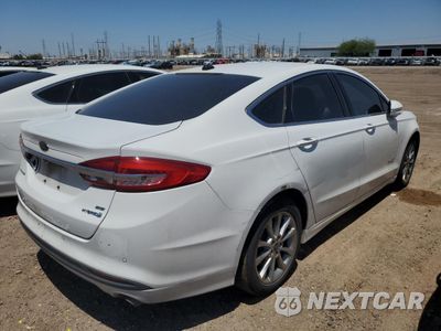 Trzecie zdjęcie samochodu z tyłu: 2017 FORD FUSION SE HYBRID VIN:3FA6P0LUXHR409175 - miniatura
