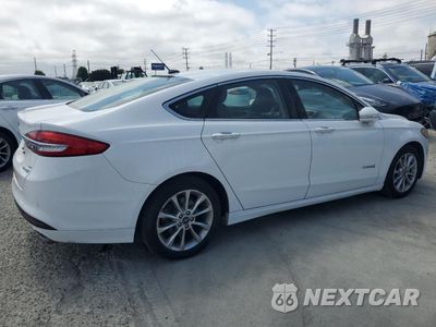 Trzecie zdjęcie samochodu z tyłu: 2017 FORD FUSION SE HYBRID VIN:3FA6P0LU3HR409289 - miniatura