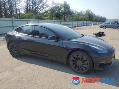 Czwarte zdjęcie samochodu z boku: 2023 TESLA MODEL 3 VIN:5YJ3E1ECXPF471334 - miniatura