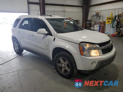 Czwarte zdjęcie samochodu z boku: 2006 CHEVROLET EQUINOX LT VIN:2CNDL63F566107519 - miniatura