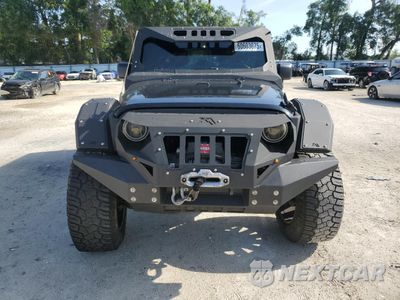 Piąte zdjęcie samochodu w środku: 2017 JEEP WRANGLER UNLIMITED SPORT VIN:1C4BJWDG0HL675454 - miniatura