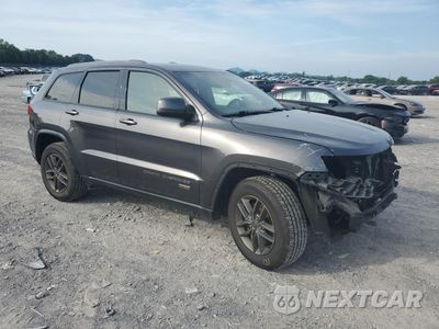Czwarte zdjęcie samochodu z boku: 2016 JEEP GRAND CHEROKEE LAREDO VIN:1C4RJEAG1GC506443 - miniatura