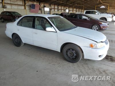 Czwarte zdjęcie samochodu z boku: 2002 TOYOTA COROLLA CE VIN:1NXBR12E32Z614500 - miniatura