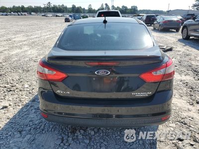 Zdjęcie 6 z 13 samochodu: 2014 FORD FOCUS TITANIUM VIN:1FADP3J26EL123781 - miniatura