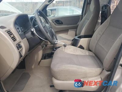 Zdjęcie 7 z 12 samochodu: 2001 FORD ESCAPE XLT VIN:1FMYU03181KE78292 - miniatura