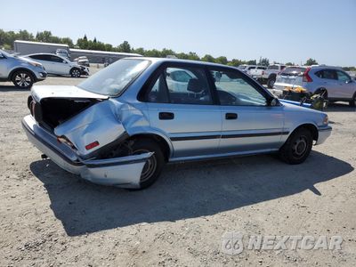 Trzecie zdjęcie samochodu z tyłu: 1991 TOYOTA COROLLA DLX VIN:1NXAE94A6MZ262645 - miniatura