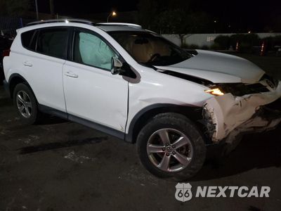 Czwarte zdjęcie samochodu z boku: 2015 TOYOTA RAV4 XLE VIN:2T3RFREV4FW406690 - miniatura