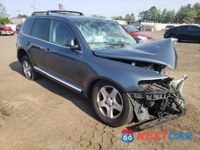 Czwarte zdjęcie samochodu z boku: 2004 VOLKSWAGEN TOUAREG 3.2 VIN:WVGZC67L34D001669 - miniatura